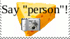 cheese with a camera saying 'say person'